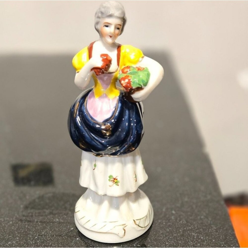 Antique Occupied Japan figurine Lady w/ flower basket gold gilding collectible